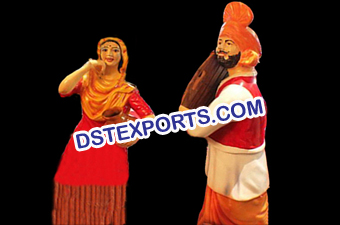 Punjabi Dancing Couple Statues
