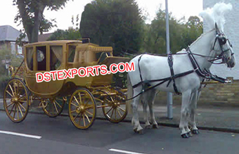 Golden Covered Horse Drawn Carriage